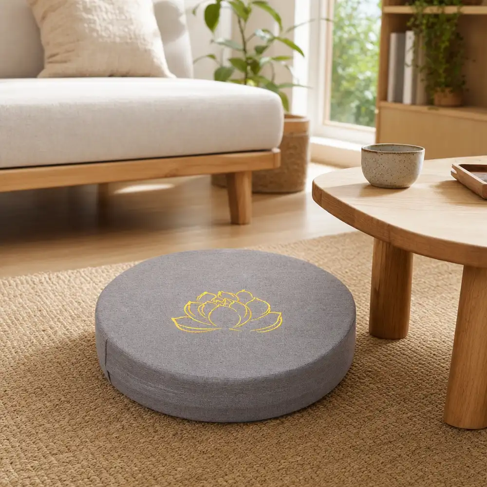 StillSeat round linen floor cushion set out in a bright living room reading corner